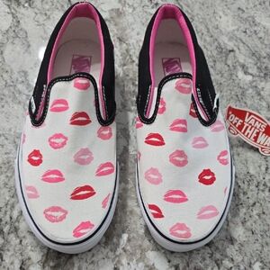 Vans Pink and Black Sneakers with Playful Design